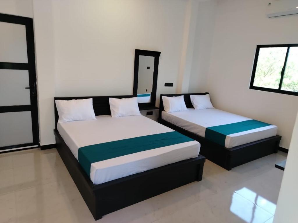 Ένα ή περισσότερα κρεβάτια σε δωμάτιο στο Prestige Villa