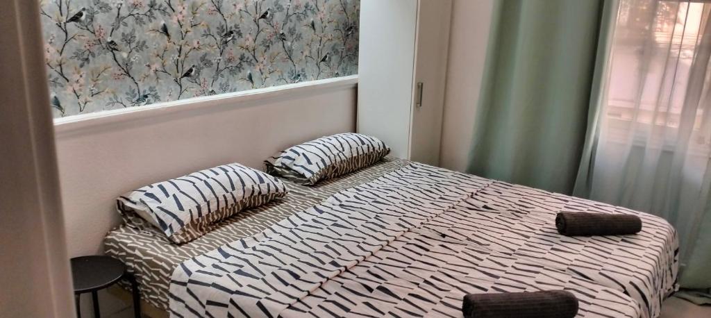 Кровать или кровати в номере La Marina