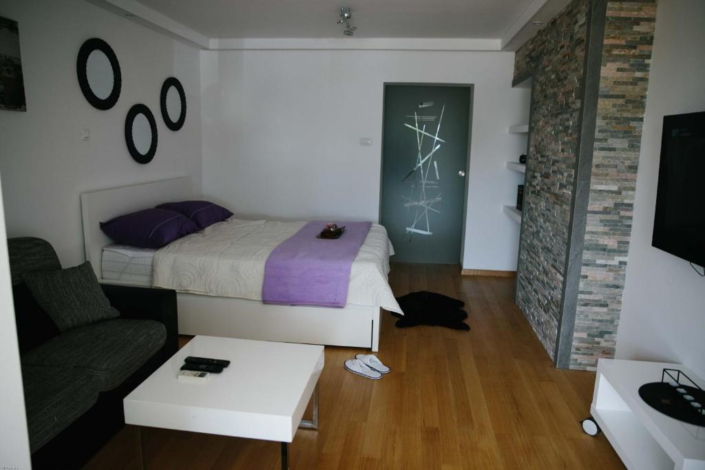 Postel nebo postele na pokoji v ubytování Studioapartman Kostrena