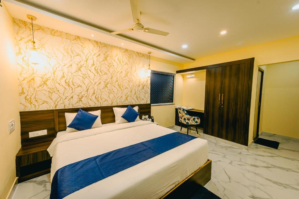 Postel nebo postele na pokoji v ubytování Livotel Premium Hotel