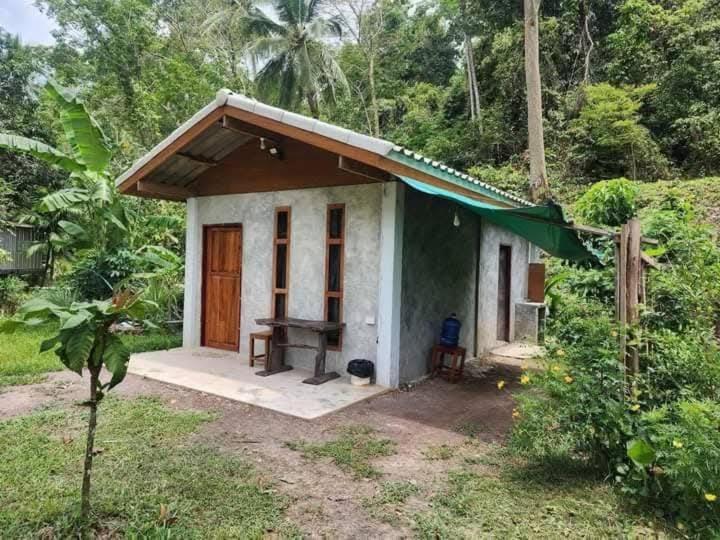 a small house in the middle of a forest at Uncle peiyk homestay in Ban Bang Bao