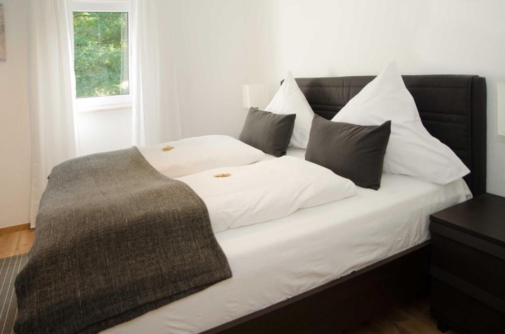 Postel nebo postele na pokoji v ubytování Apart Hotel Paradies