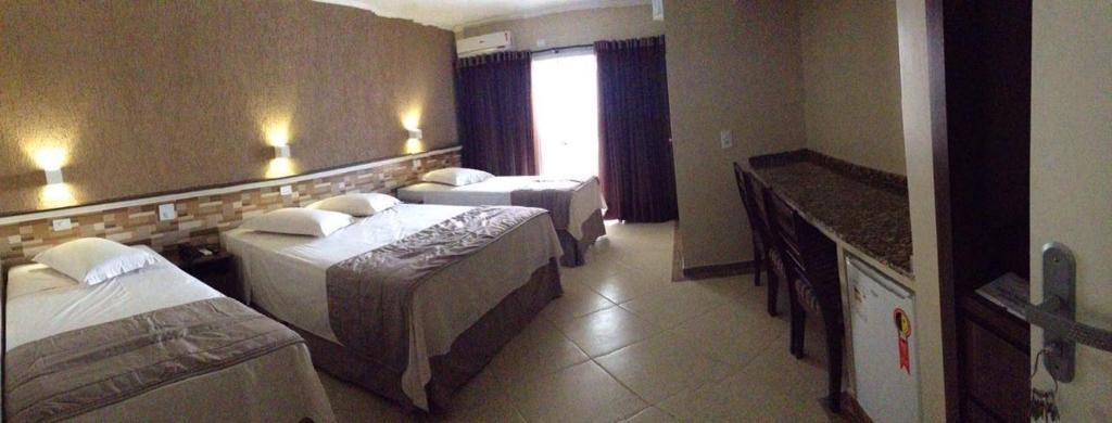 Postel nebo postele na pokoji v ubytování Hotel Palacio