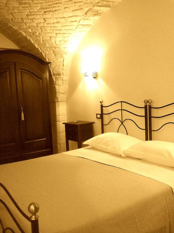 Postel nebo postele na pokoji v ubytování La Dolce Vite
