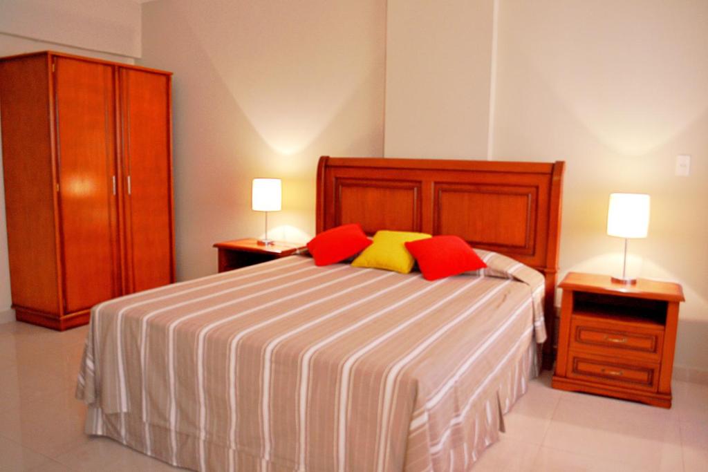 Letto o letti in una camera di Hotel Manduara