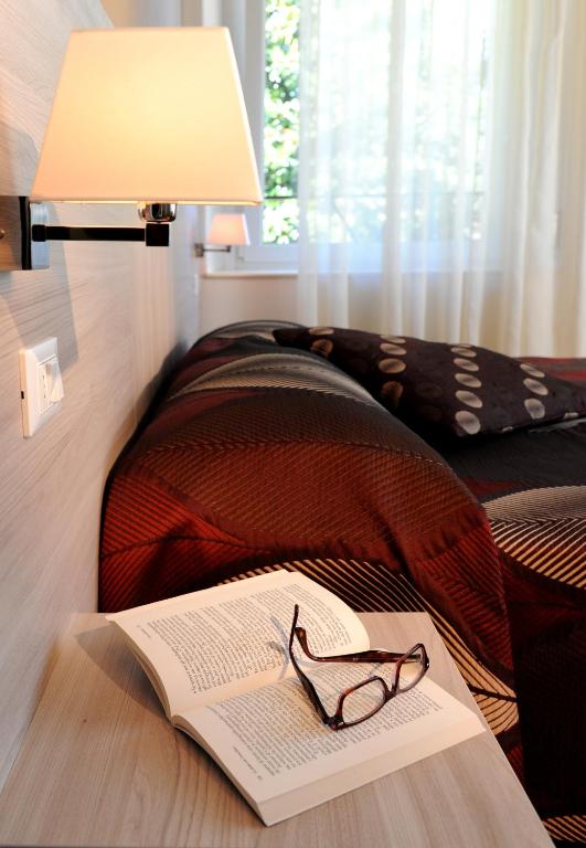 Albergo Valentinaにあるベッド
