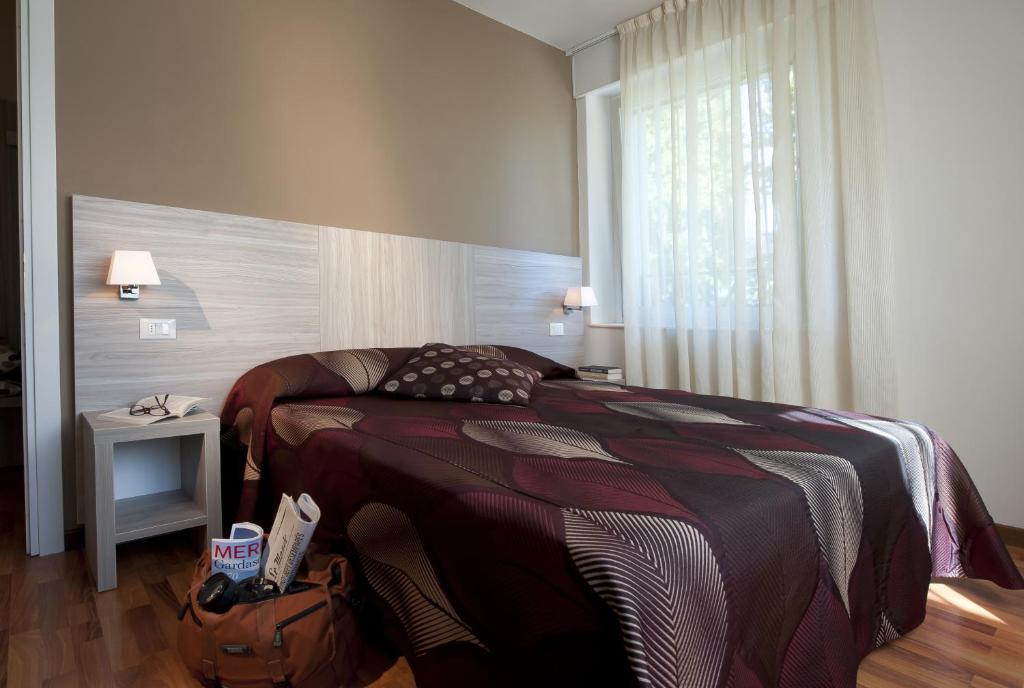 Albergo Valentinaにあるベッド