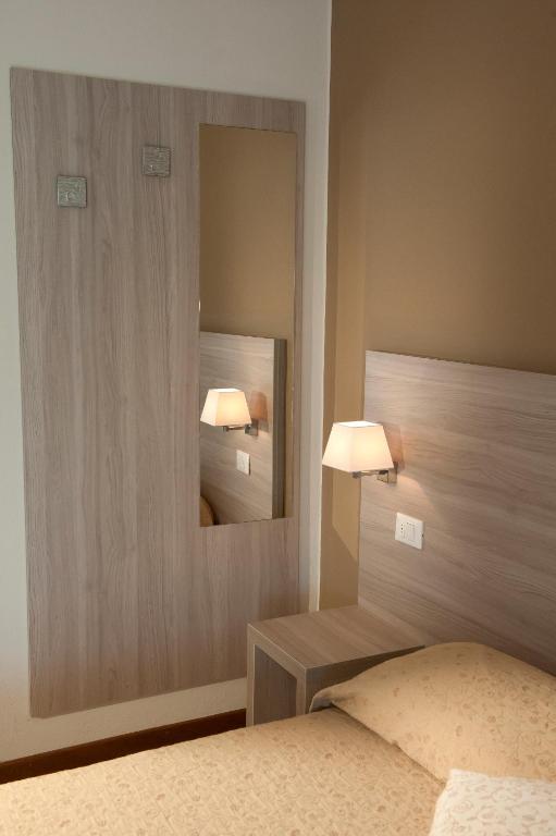 Albergo Valentinaにあるベッド
