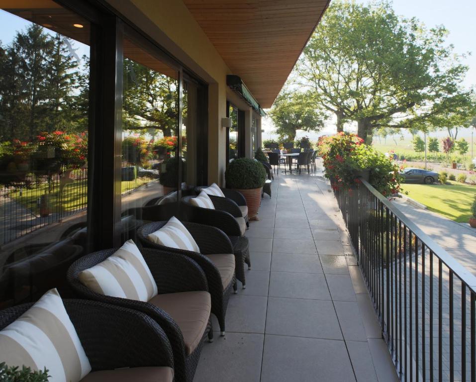 Posezení v ubytování Hôtel Restaurant Logis Auberge Sundgovienne