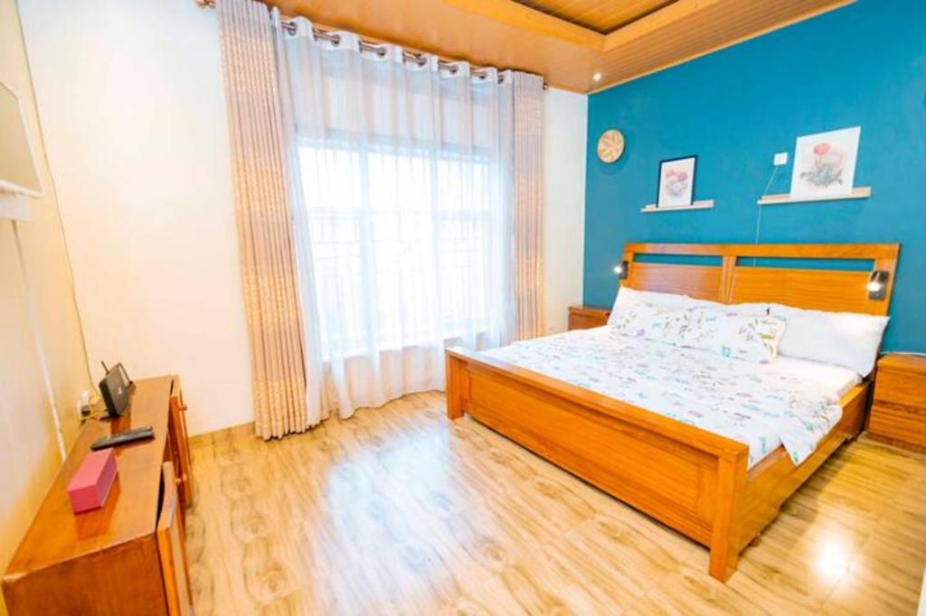 Postel nebo postele na pokoji v ubytování Homescapes