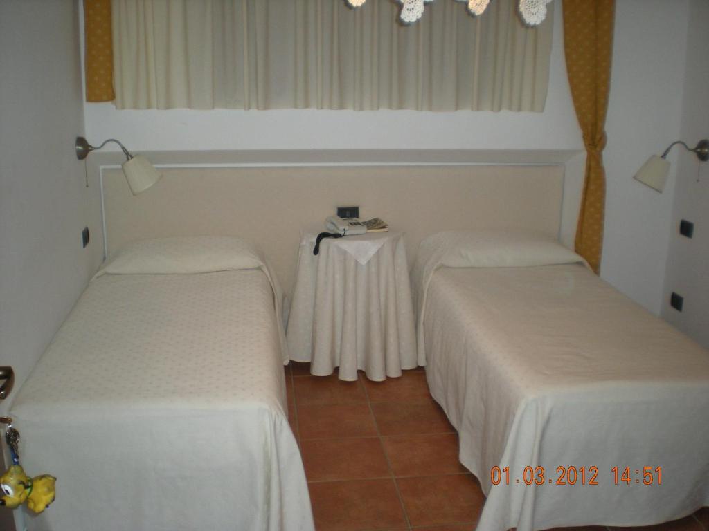 Postel nebo postele na pokoji v ubytování Bike-Hotel Abete