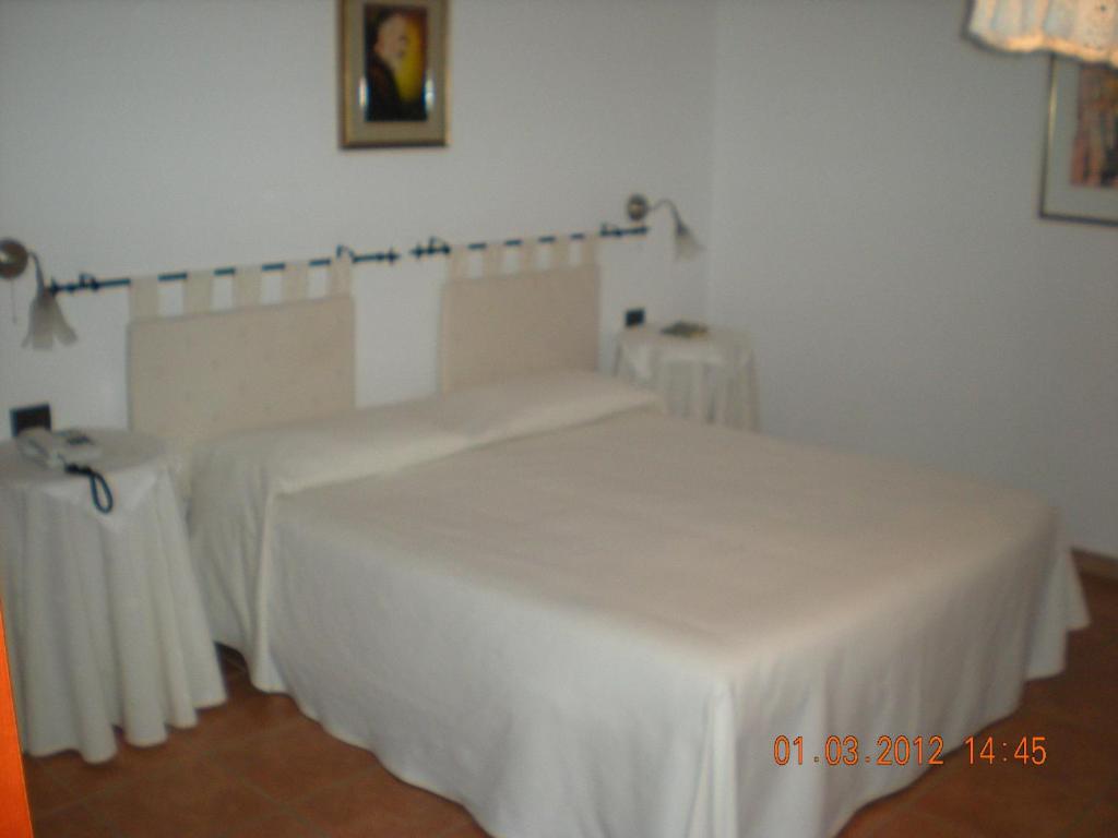 Postel nebo postele na pokoji v ubytování Bike-Hotel Abete