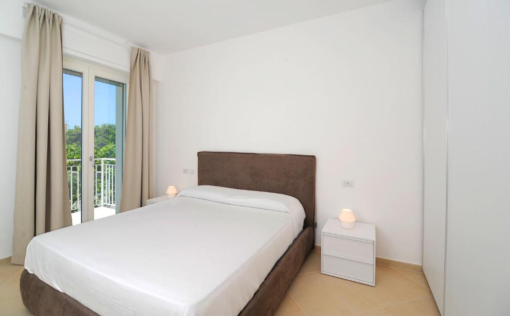 Posteľ alebo postele v izbe v ubytovaní Relais Le Due Costiere