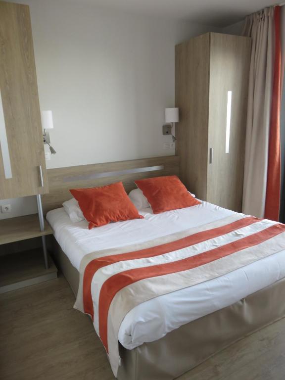 Vuode tai vuoteita majoituspaikassa Appart-Hôtel Mer & Golf City Bordeaux - Bruges