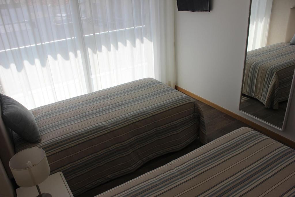 Uma área de estar em Apartamentos Turisticos da Nazare