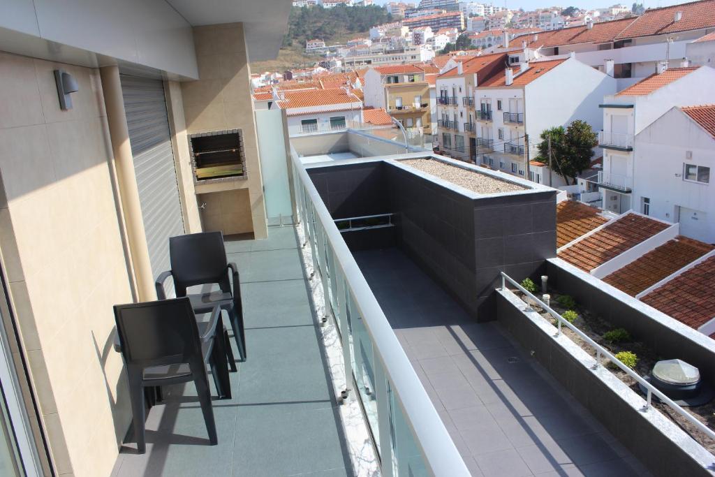 Uma varanda ou terraço em Apartamentos Turisticos da Nazare