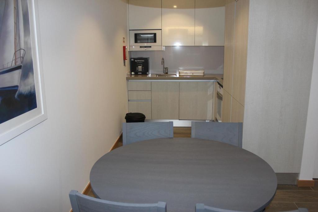 A cozinha ou cozinha compacta de Apartamentos Turisticos da Nazare