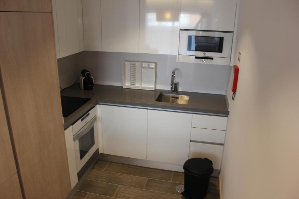 A cozinha ou cozinha compacta de Apartamentos Turisticos da Nazare