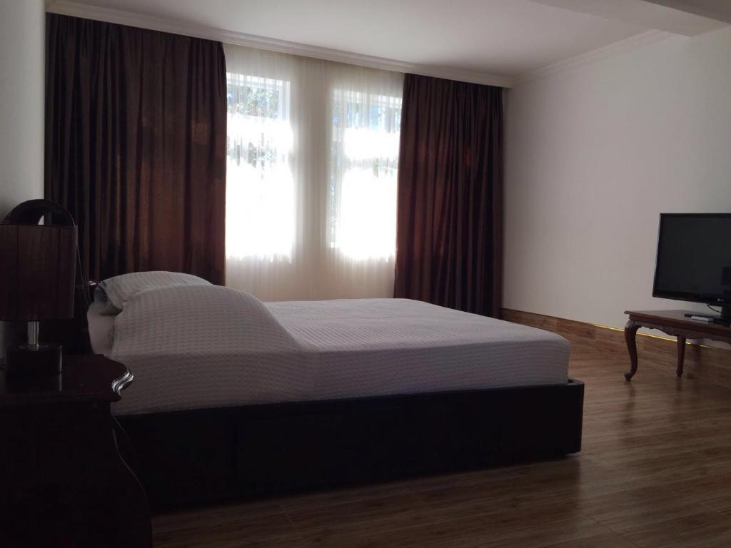 TV a/nebo společenská místnost v ubytování Hotel Simpatia