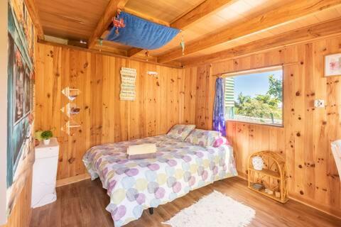 Postel nebo postele na pokoji v ubytování Cabaña de Tarzán