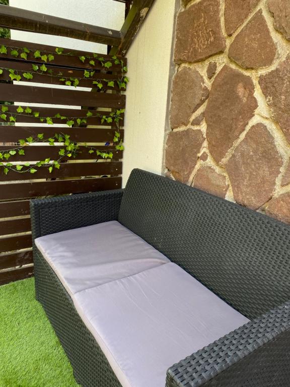 Postel nebo postele na pokoji v ubytování FLÓRA VENDÉGHÁZ A BALATONNÁL