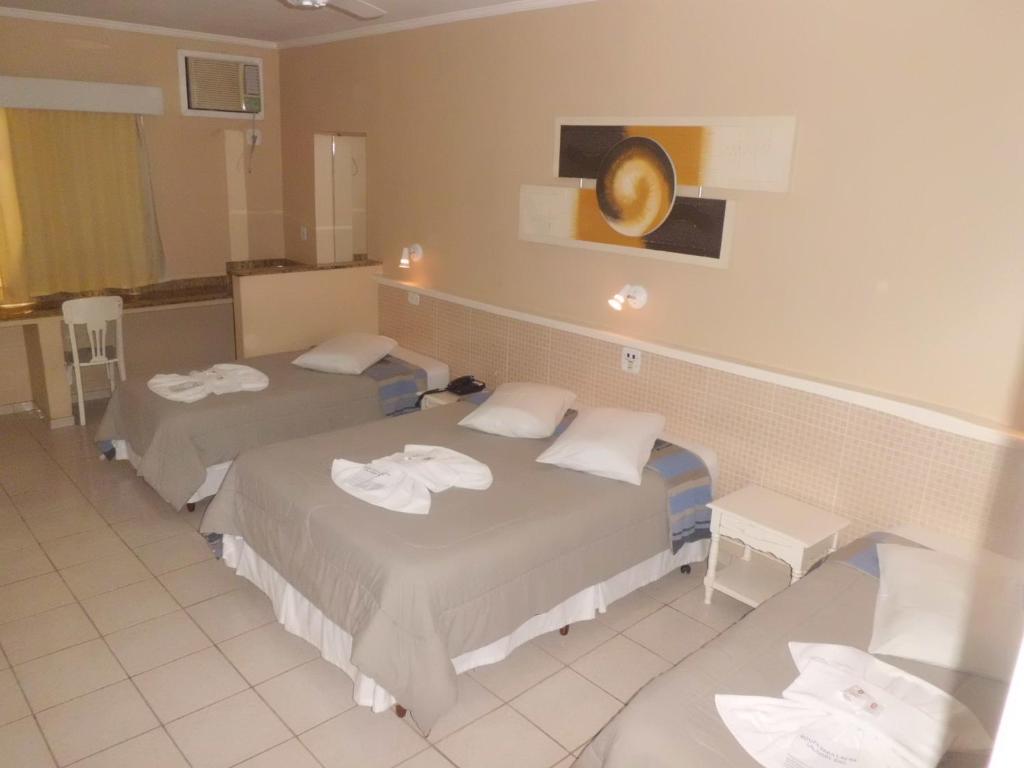 Postel nebo postele na pokoji v ubytování Hotel Palacio