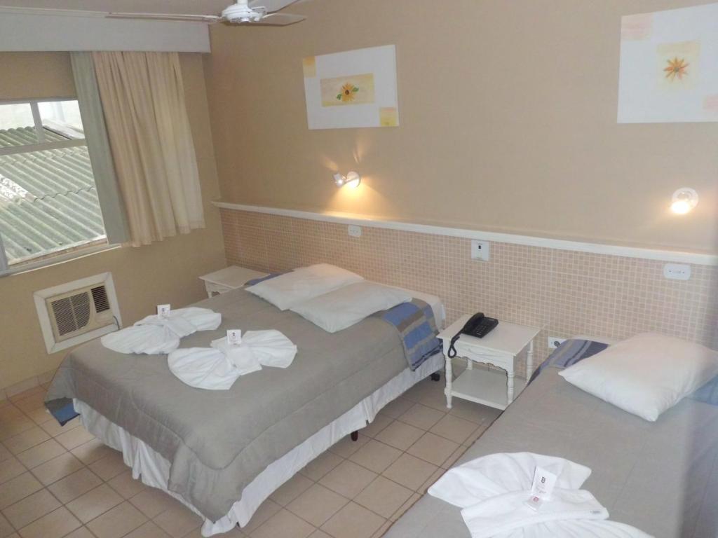 Postel nebo postele na pokoji v ubytování Hotel Palacio