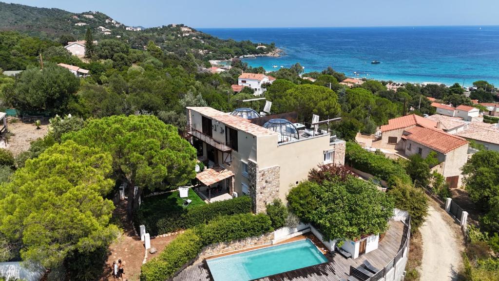 an aerial view of a house with a swimming pool at La Villa in Favone