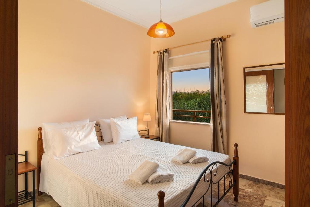 Postel nebo postele na pokoji v ubytování Sirens House