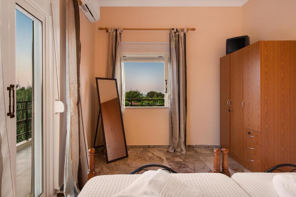 Postel nebo postele na pokoji v ubytování Sirens House