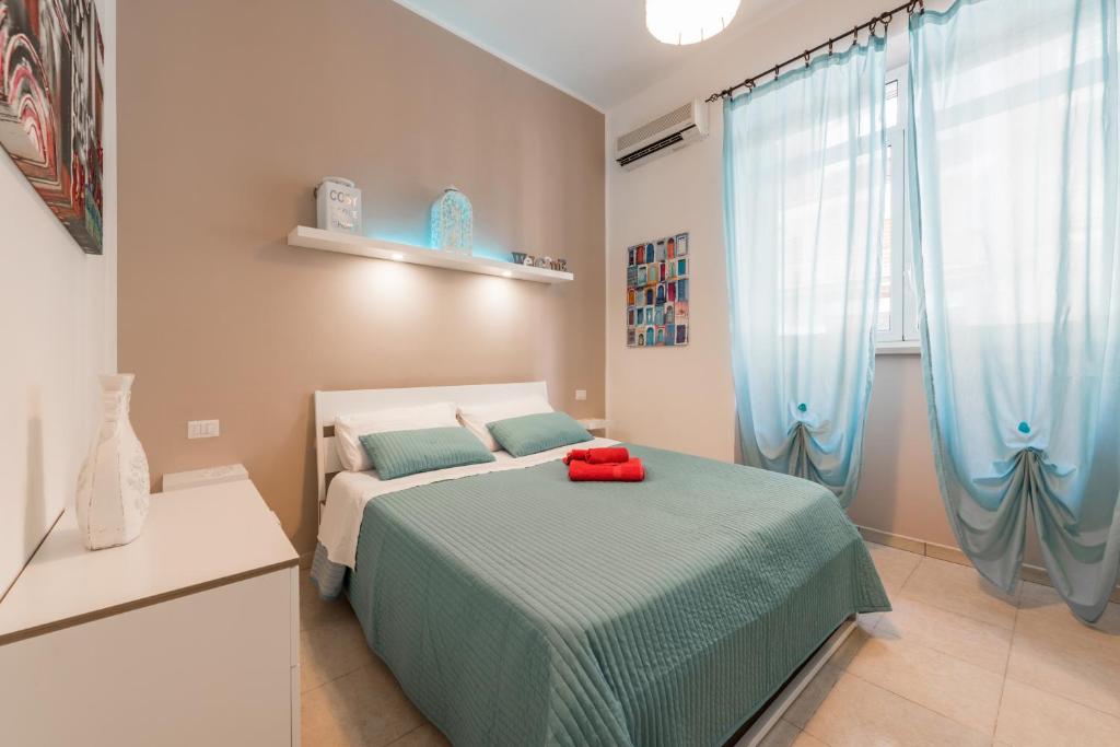 Postel nebo postele na pokoji v ubytování Bari Design City Centre