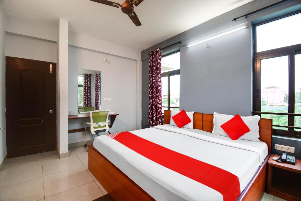 Postel nebo postele na pokoji v ubytování Hotel O Urban Legends