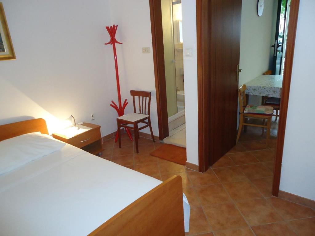 Posteľ alebo postele v izbe v ubytovaní Omiš apartment on the beach