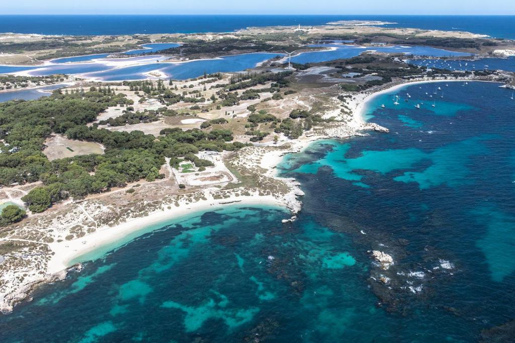
a large body of water with a beach at Karma Rottnest in Rottnest Island
