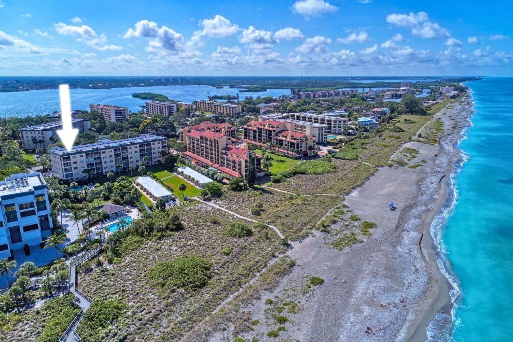 an aerial view of a resort on the beach at Playing Hooky in Siesta Key
