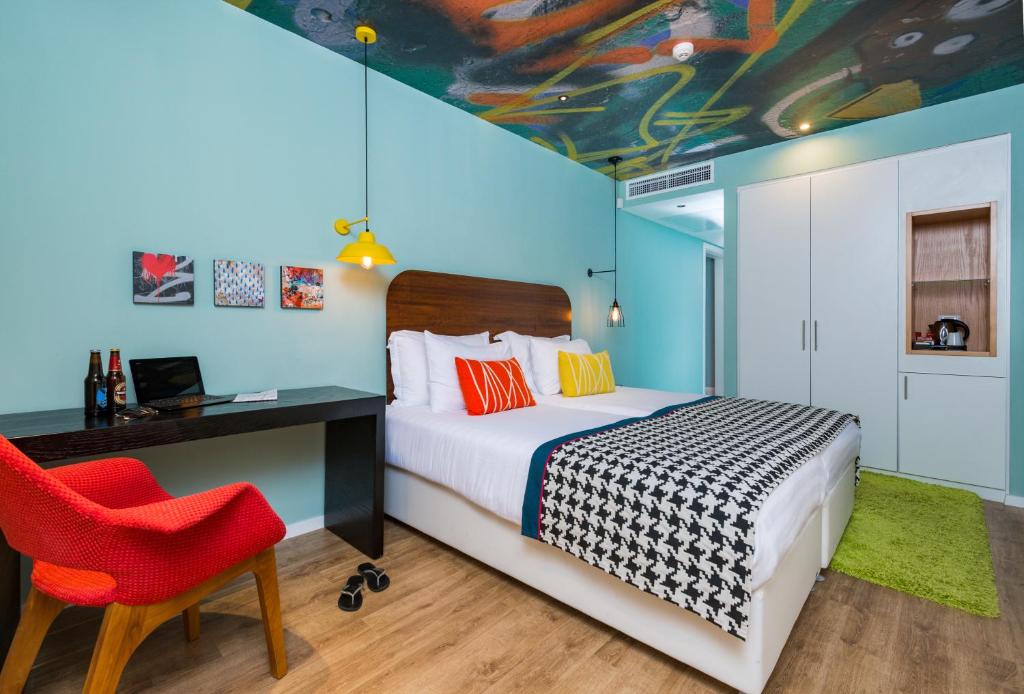 Voodi või voodid majutusasutuse Hotel 75 by Prima Hotels toas