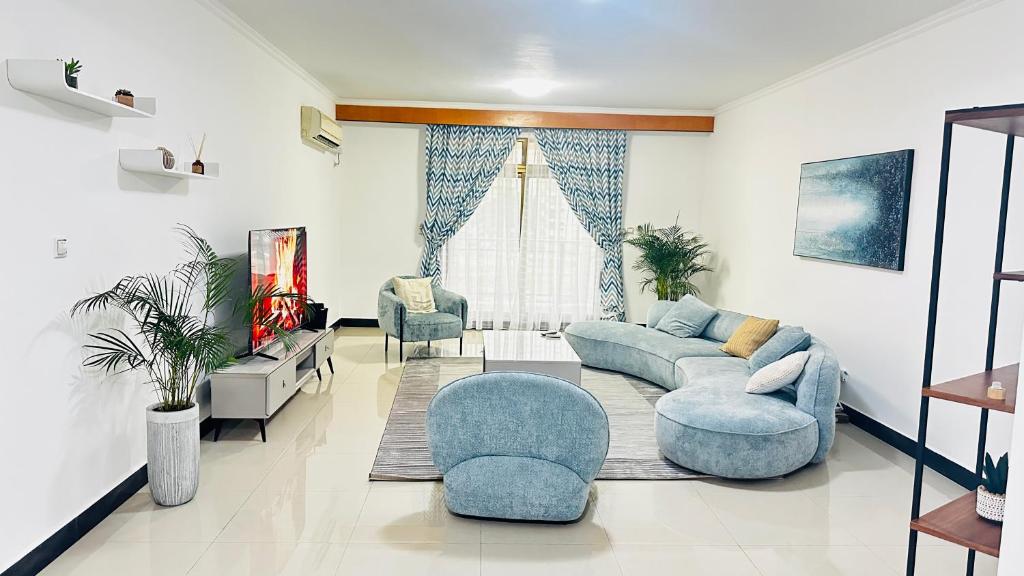אזור ישיבה ב-Lilas appartement