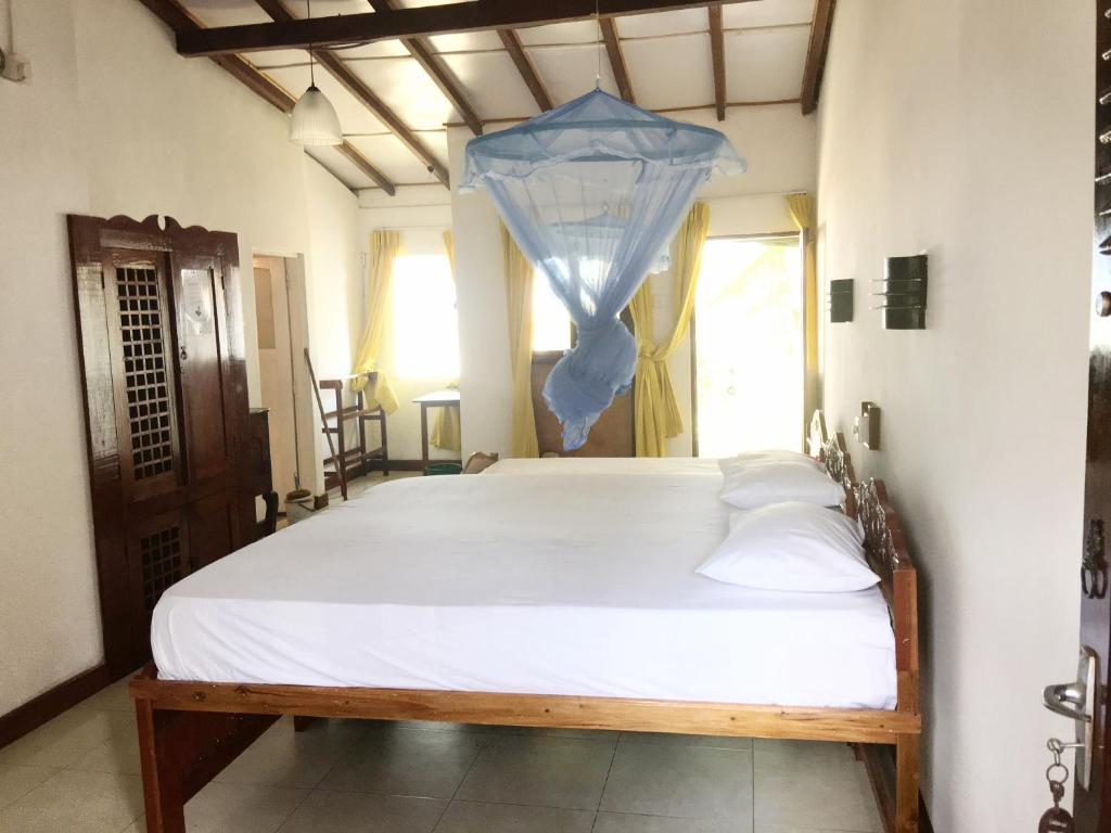 Postel nebo postele na pokoji v ubytování Dephani Beach Hotel