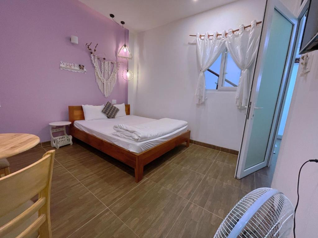 Giường trong phòng chung tại Selena Dalat Homestay