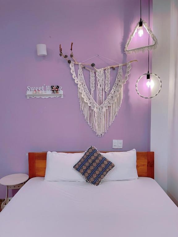Giường trong phòng chung tại Selena Dalat Homestay