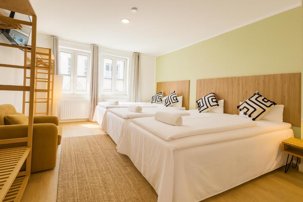 Ένα ή περισσότερα κρεβάτια σε δωμάτιο στο Stadtpark Apartments by stay awesome