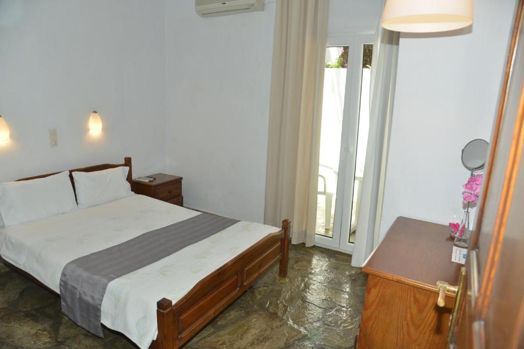 Postel nebo postele na pokoji v ubytování Hotel Anelli