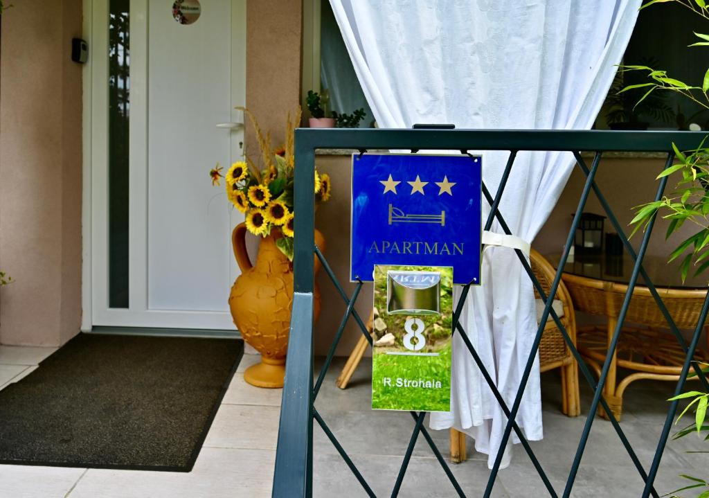 a box of marmite is sitting on a porch at Studio Apartman UNA -self check in,free parking in Karlovac
