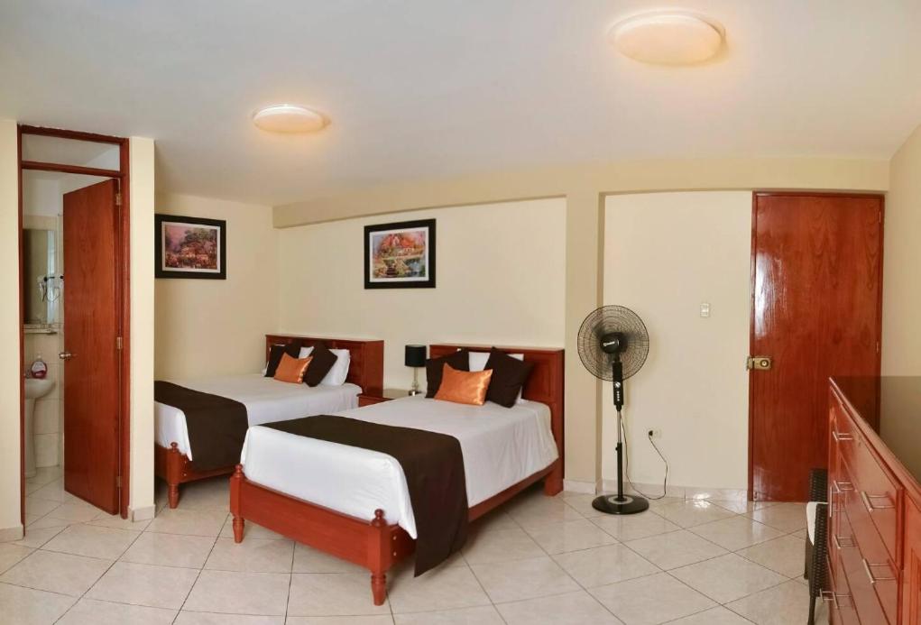 Postel nebo postele na pokoji v ubytování Hostel Esperanza