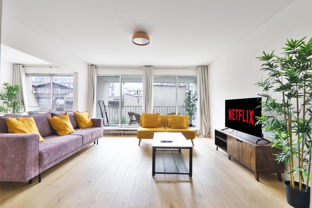 Posezení v ubytování Appartement Quartier Canal Saint Martin Free Netflix