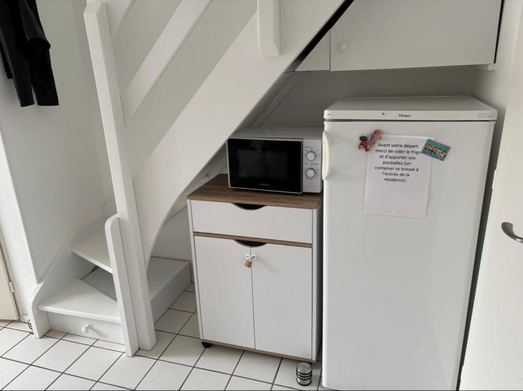 Η κουζίνα ή μικρή κουζίνα στο Maison mitoyenne dans résidence avec piscine