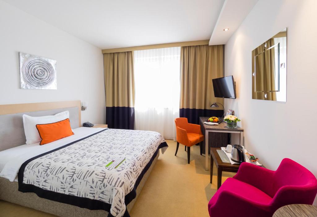 Krevet ili kreveti u jedinici u okviru objekta IN Hotel Beograd