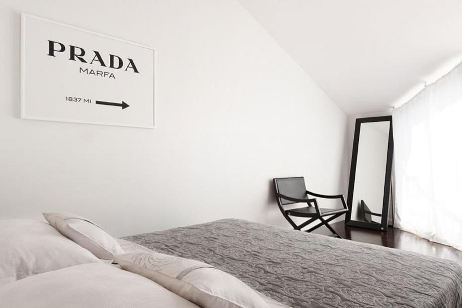 Postel nebo postele na pokoji v ubytování Marinela Suites