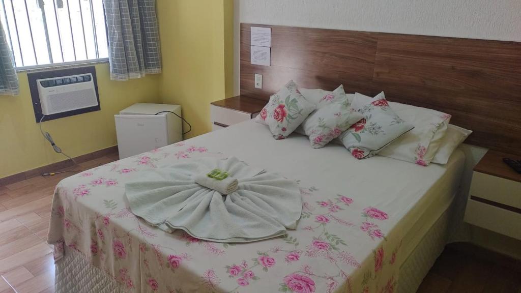 Postel nebo postele na pokoji v ubytování Cantinho do Vale Pousada
