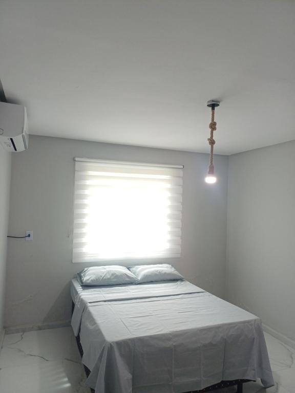Ένα ή περισσότερα κρεβάτια σε δωμάτιο στο Casa Águas de Sauipe